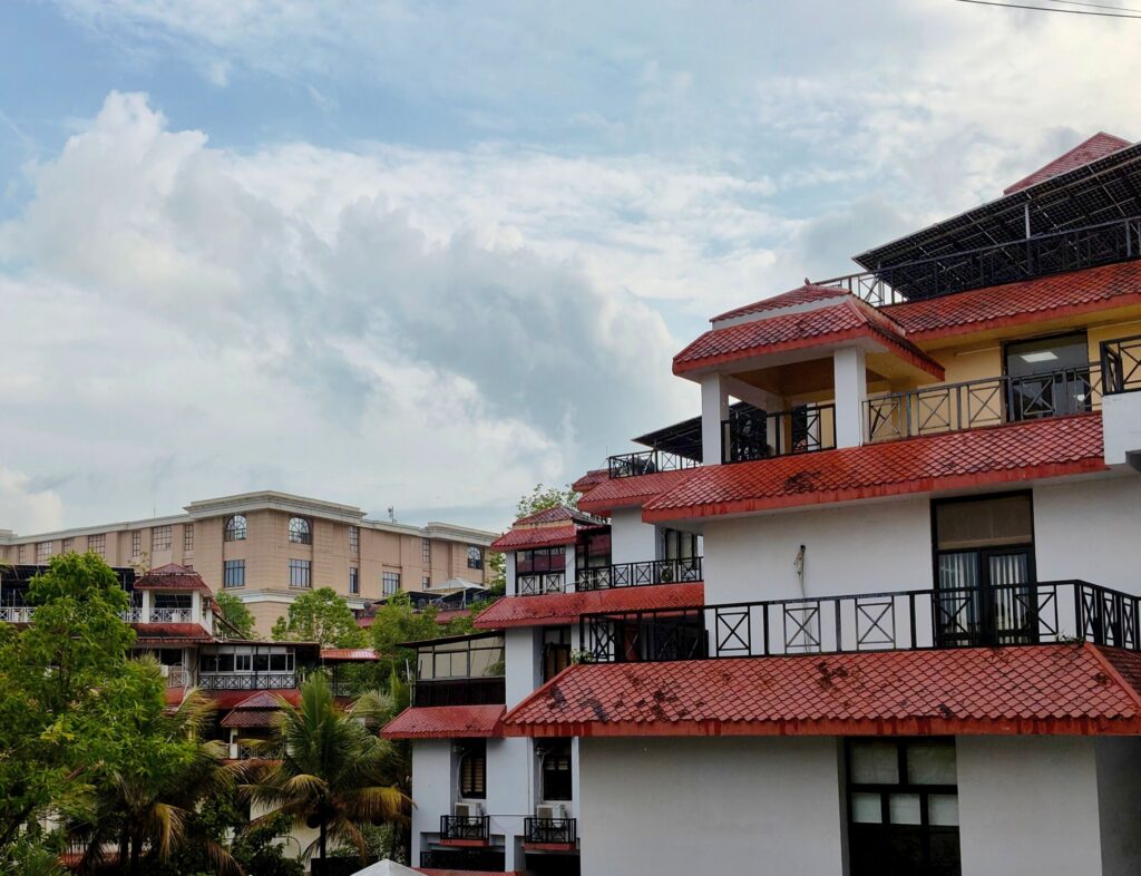 Scenic view of elegant residential buildings with red roofs on a sunny day.